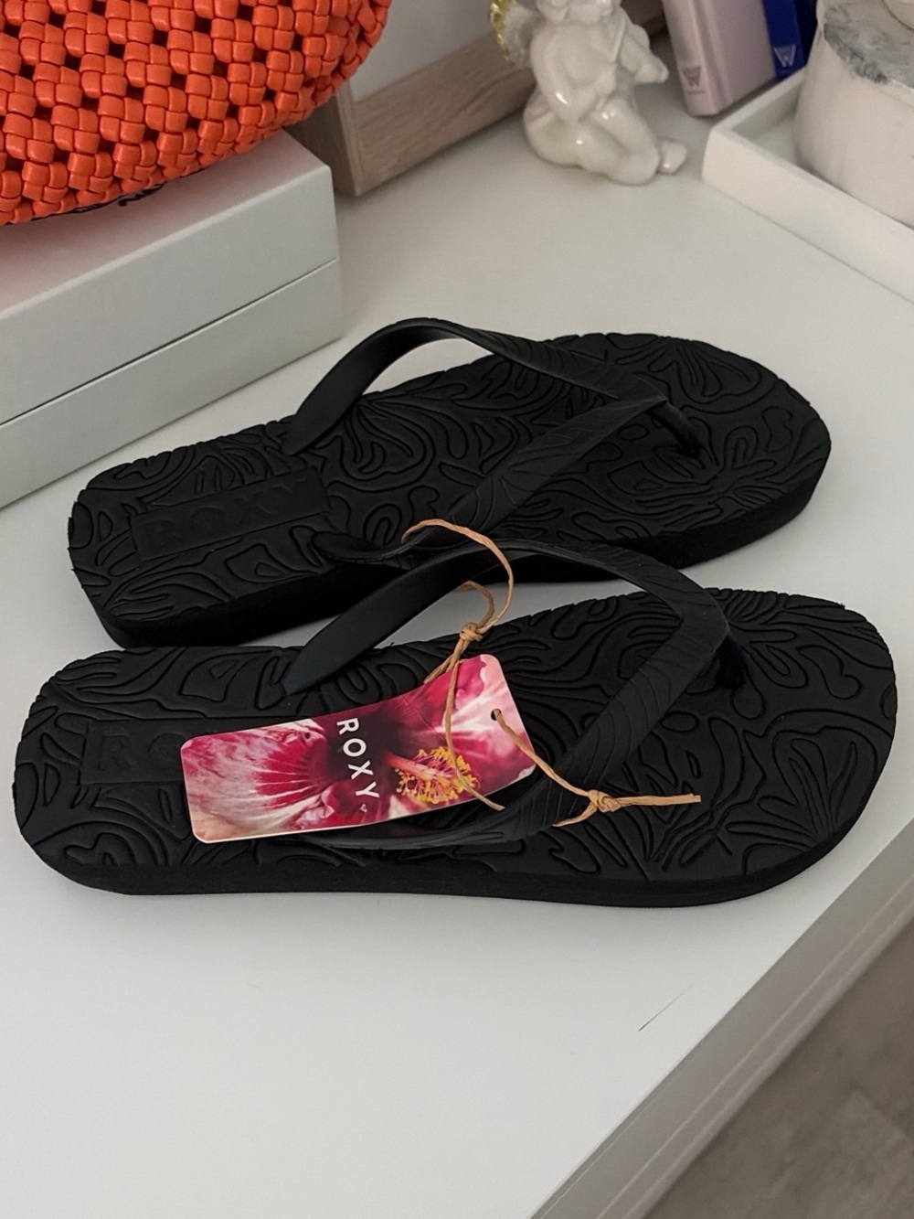 Roxy Black Textured Flip Flops with Pink Floral Tag